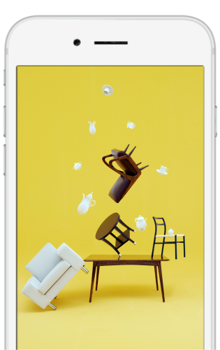flying-furniture-on-yellow-background-in-iphone-screen